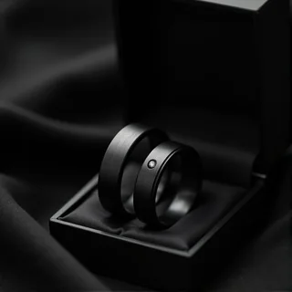 Dark zirconium wedding rings; women's ring featuring a genuine brilliant-cut diamond